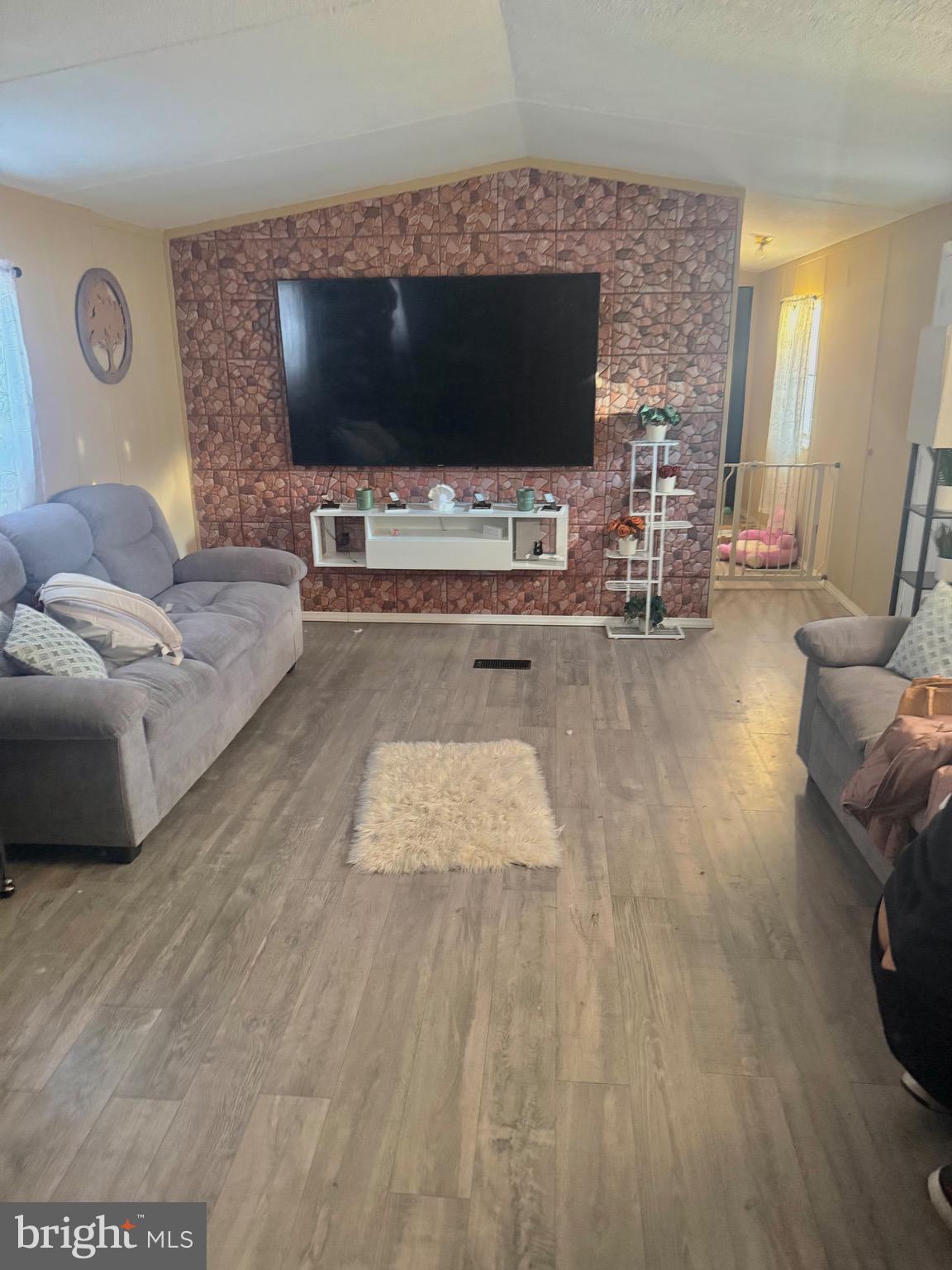 2581 Old Harrisburg Road Gettysburg, PA 17325 - Photo 2 of 15 a living room with furniture and a flat screen tv