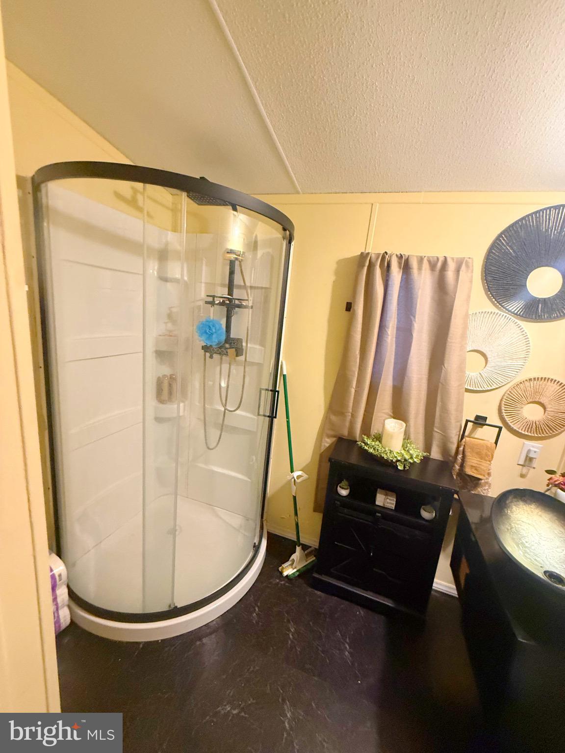 2581 Old Harrisburg Road Gettysburg, PA 17325 - Photo 7 of 15 a view of a room with water heater and wooden racks