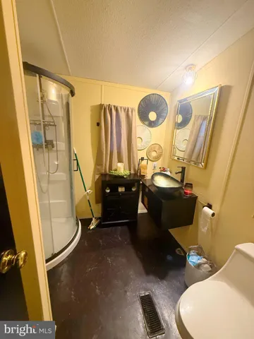 a bathroom with sink and mirror