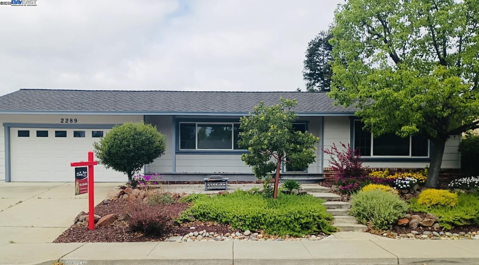 2289 Hampton Road Livermore, CA 94550 - Photo 1 of 1 a front view of a house with garden