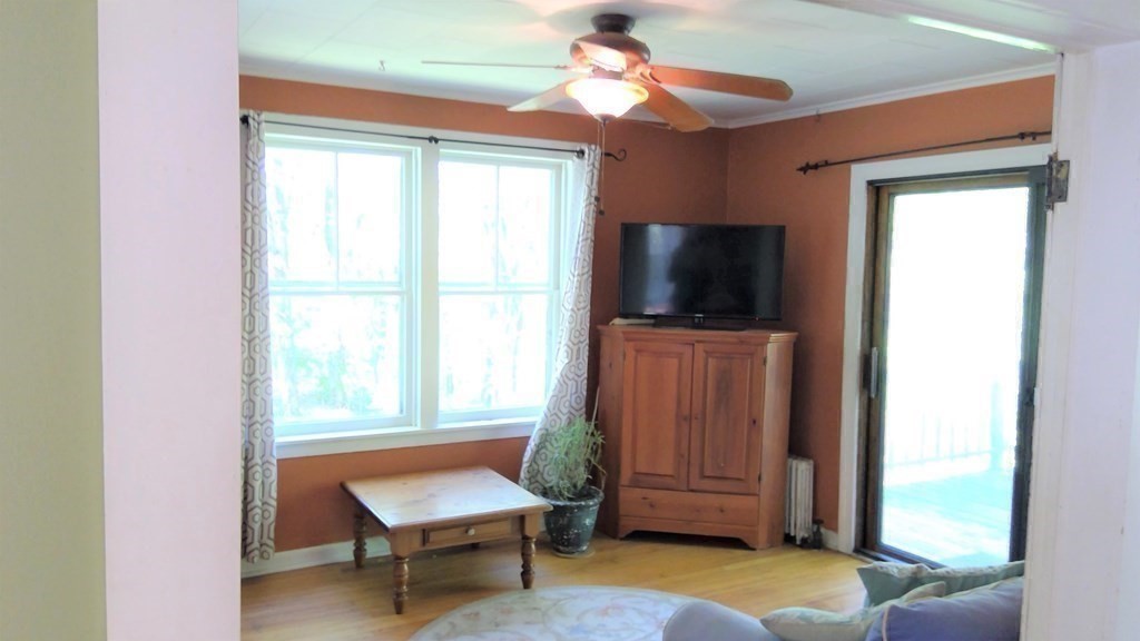 20 Frankton Road Shelburne, MA 01370 - Photo 15 of 41 a living room with furniture and a flat screen tv