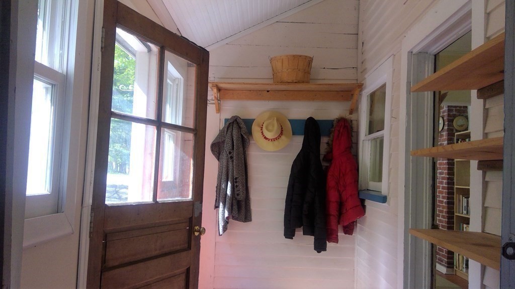 20 Frankton Road Shelburne, MA 01370 - Photo 7 of 41 a close view of walk in closet with clothes and shoes