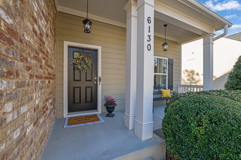 6130 Boulder Gate Way Cumming, GA 30028 - Photo 2 of 38 a view of an entryway door front of house