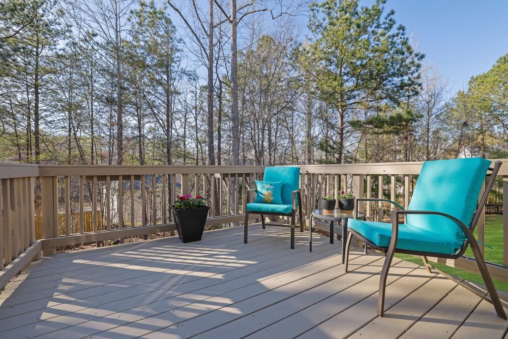 6130 Boulder Gate Way Cumming, GA 30028 - Photo 28 of 38 a view of a chairs and table in the patio