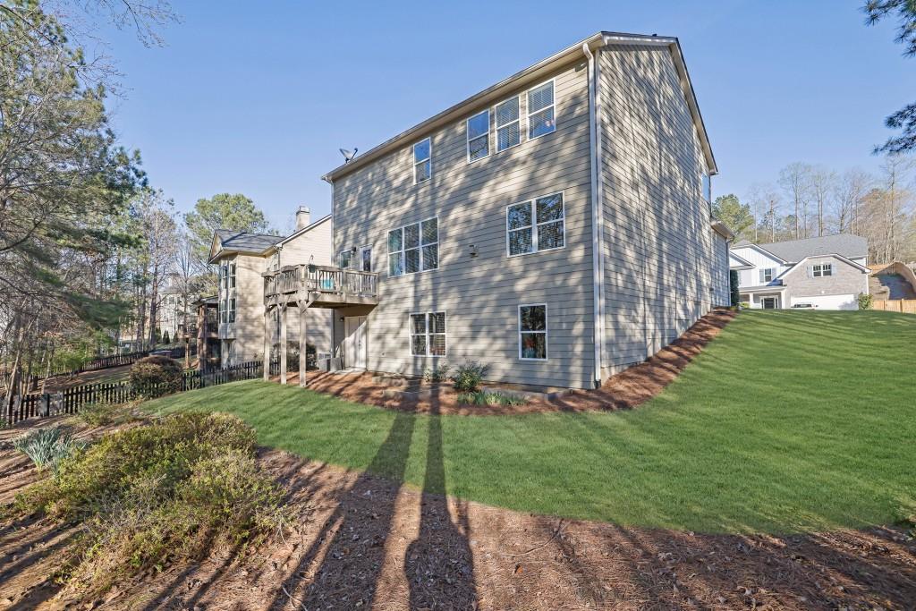 6130 Boulder Gate Way Cumming, GA 30028 - Photo 31 of 38 a view of an apartment with a yard