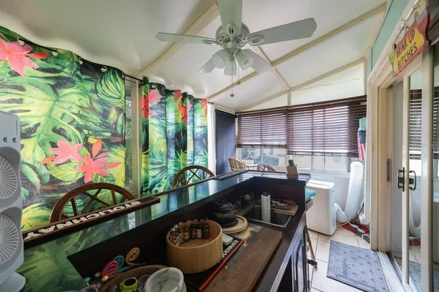 a view of a dining table and chairs