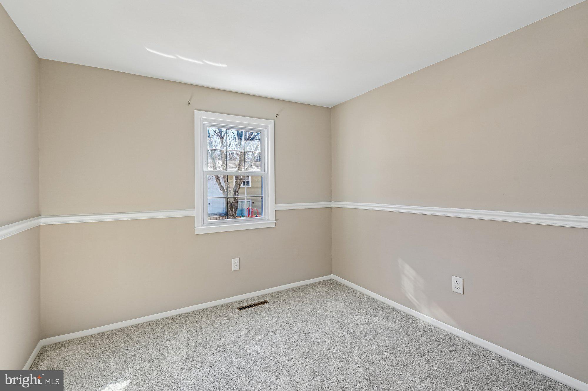 1753 Castleford Square Crofton, MD 21114 - Photo 23 of 30 a view of an empty room with a window