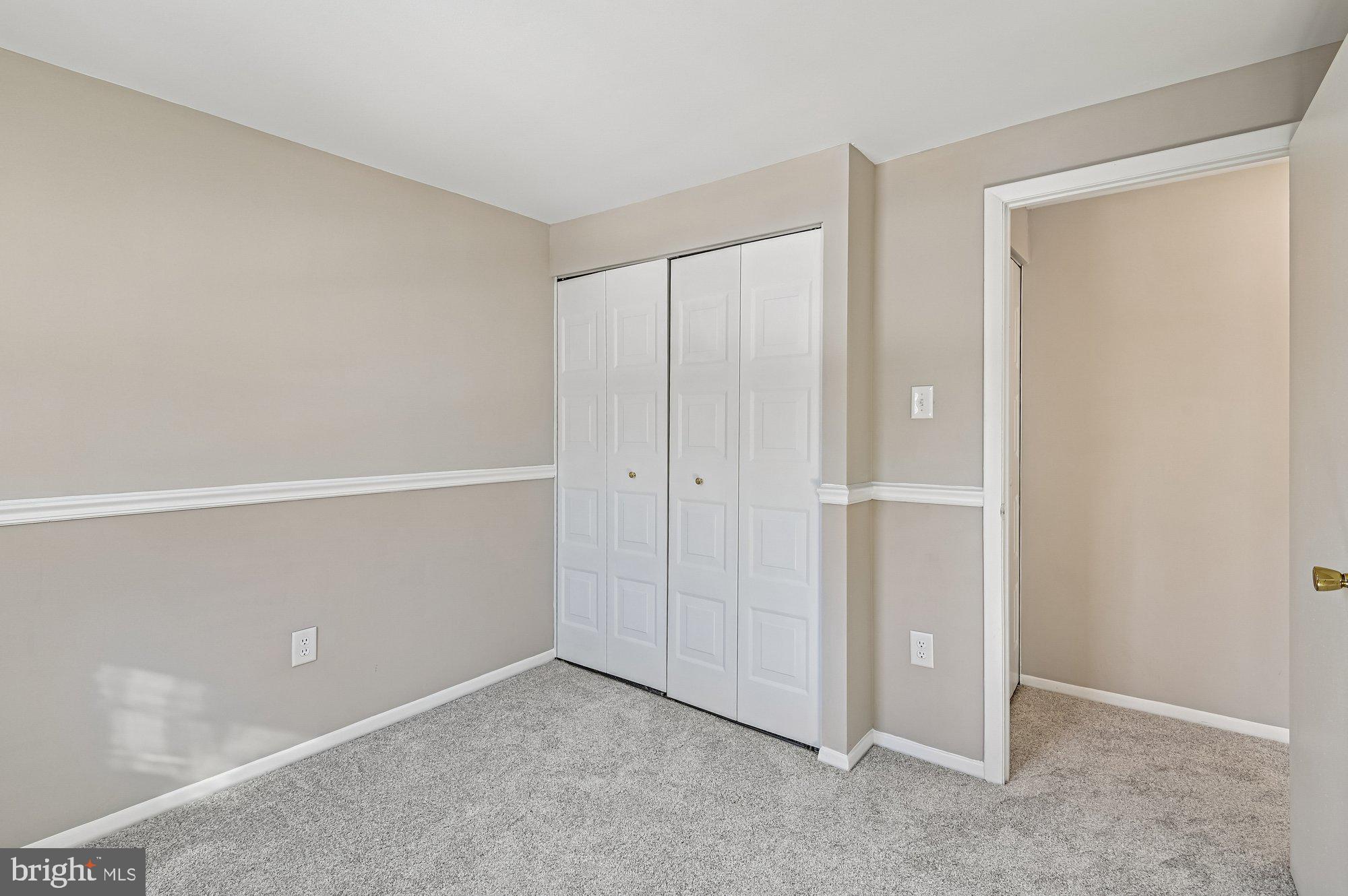 1753 Castleford Square Crofton, MD 21114 - Photo 24 of 30 an empty room with closet area