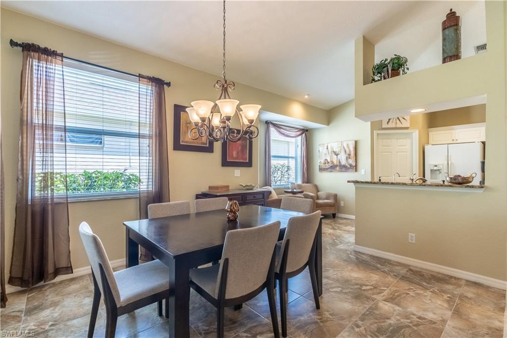 749 Crossfield Circle Naples, FL 34104 - Photo 11 of 37 a view of a dining room with furniture window and outside view