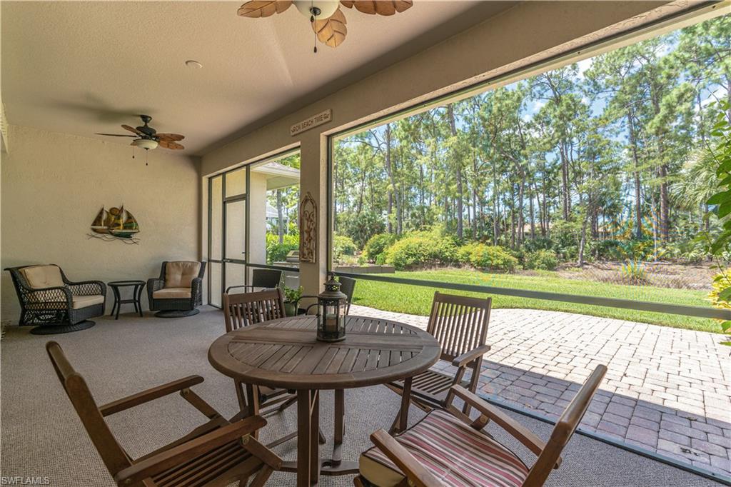 749 Crossfield Circle Naples, FL 34104 - Photo 30 of 37 a view of a dining room with furniture window and outside view