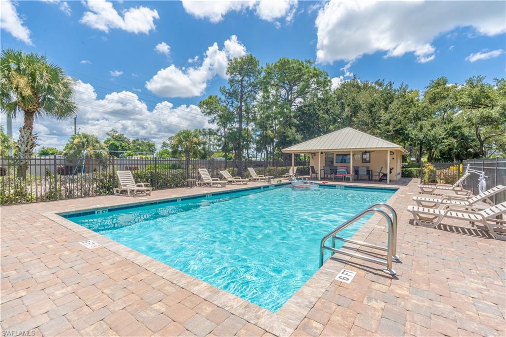 749 Crossfield Circle Naples, FL 34104 - Photo 35 of 37 a view of a house with a yard