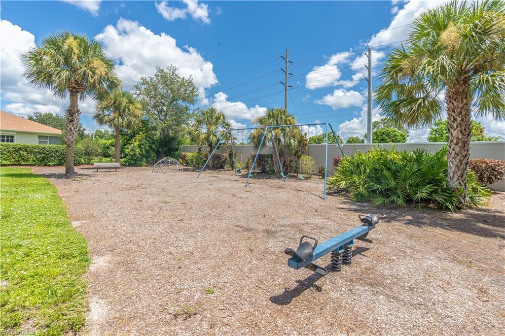 749 Crossfield Circle Naples, FL 34104 - Photo 37 of 37 a backyard of a house with lots of green space