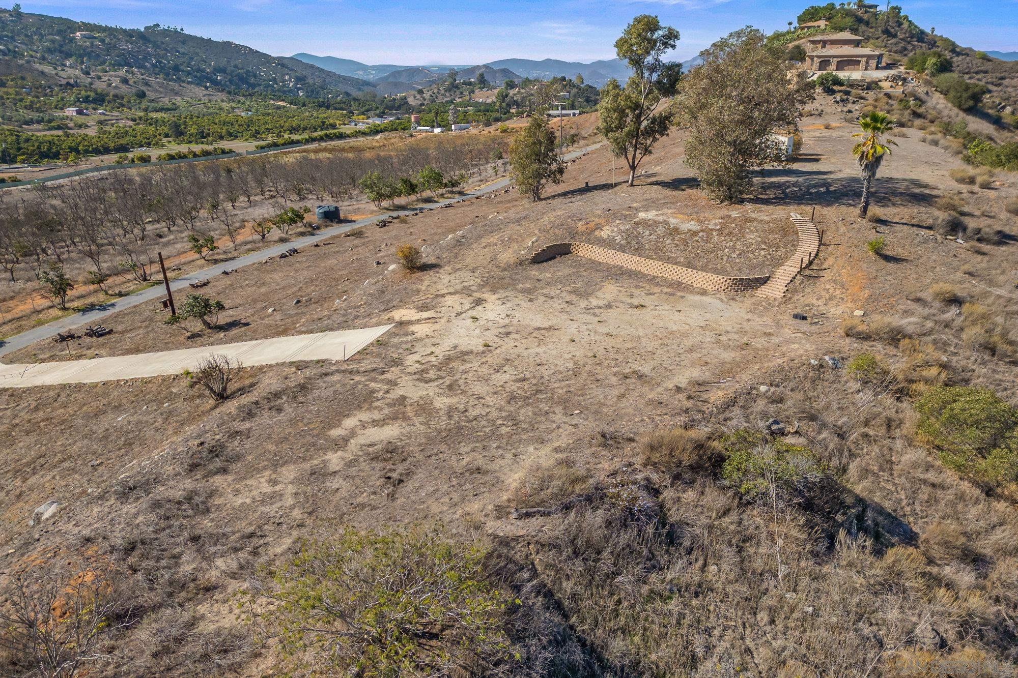 15840 Highland Valley Road Escondido, CA 92025 - Photo 11 of 18 a view of a lake with mountain