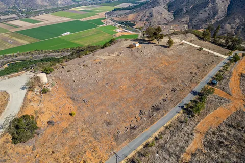 a view of a backyard of a house