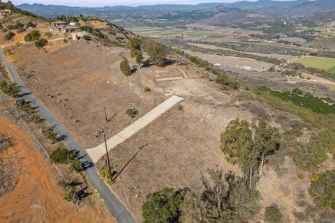 a view of a yard with an outdoor space