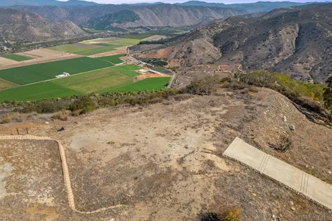 a view of a lake with mountain
