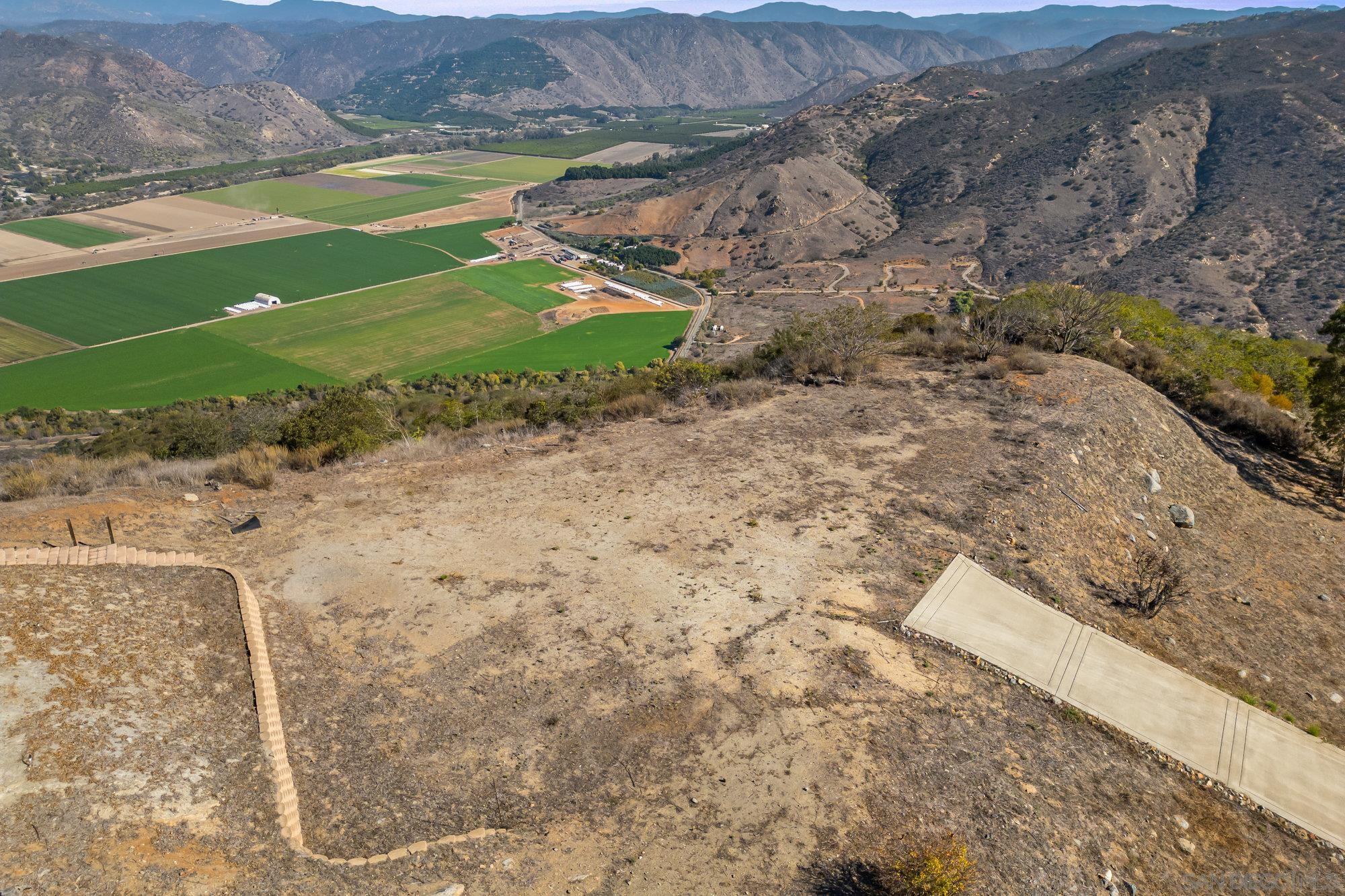 15840 Highland Valley Road Escondido, CA 92025 - Photo 10 of 18 a view of a yard with an outdoor space