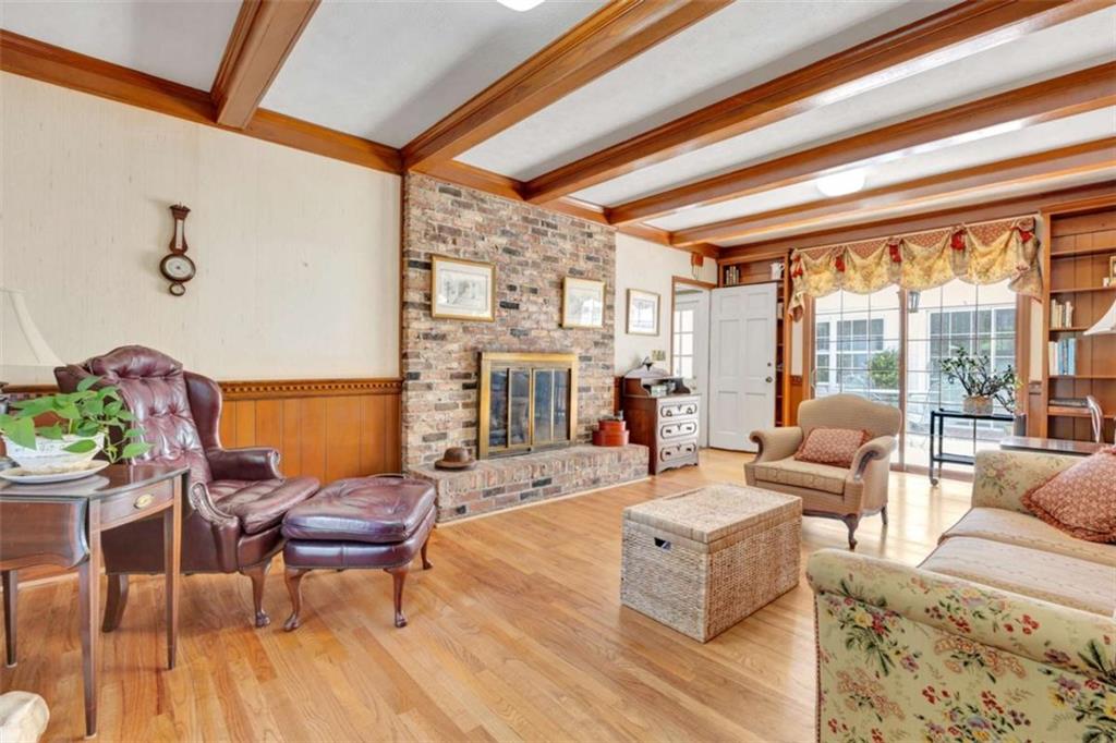 103 Gabriel Way Social Circle, GA 30025 - Photo 25 of 70 a living room with fireplace furniture and a large window