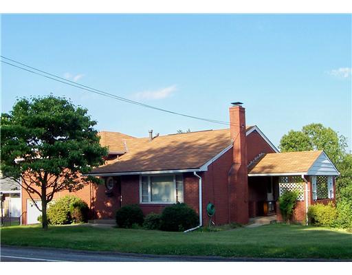 Exterior Front. Custom Built Brick Multi Level