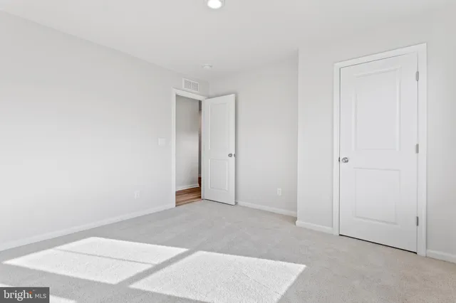 an empty room with an entryway