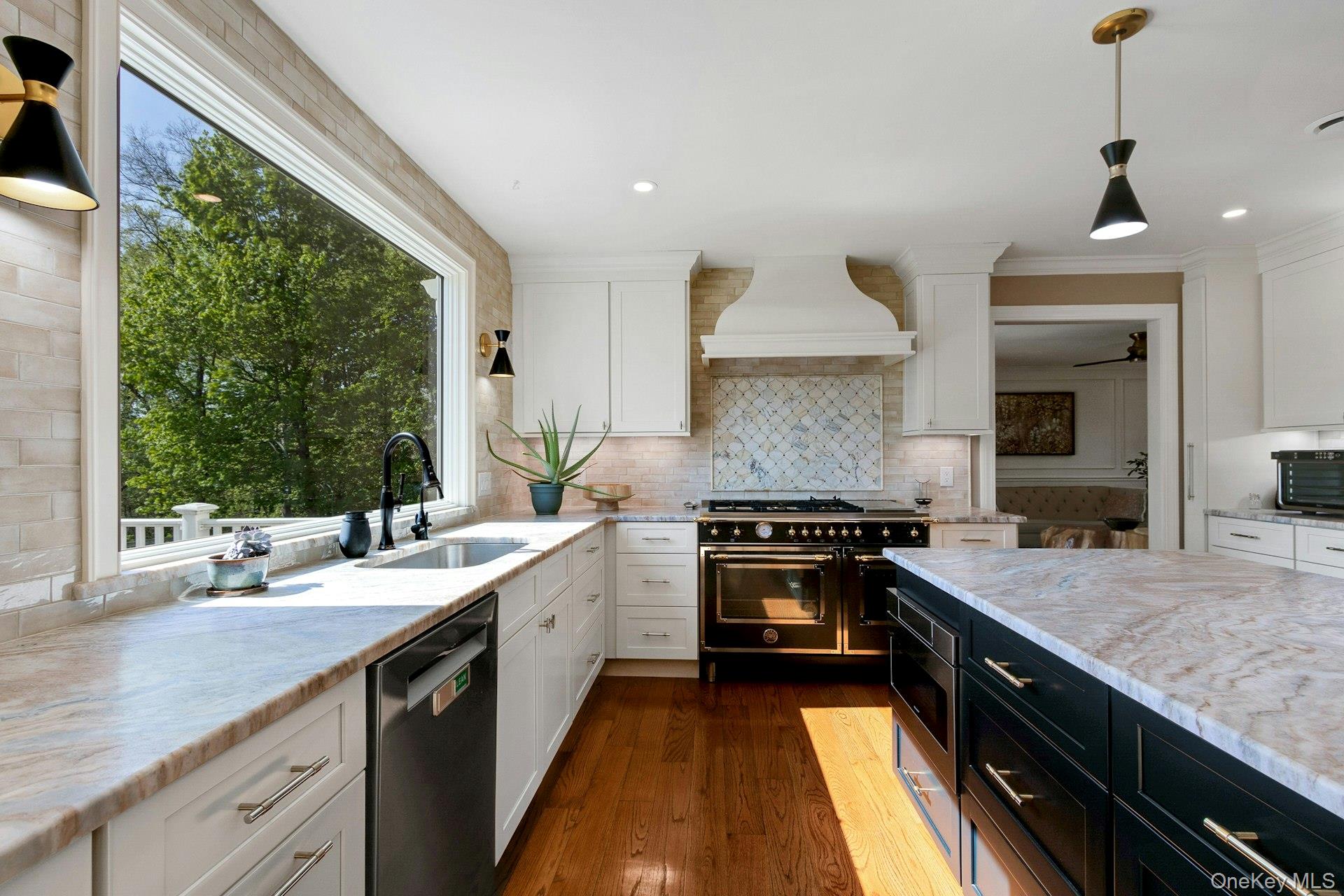 97 Moffat Road Washingtonville, NY 10992 - Photo 13 of 48 a kitchen with a sink stove and cabinets