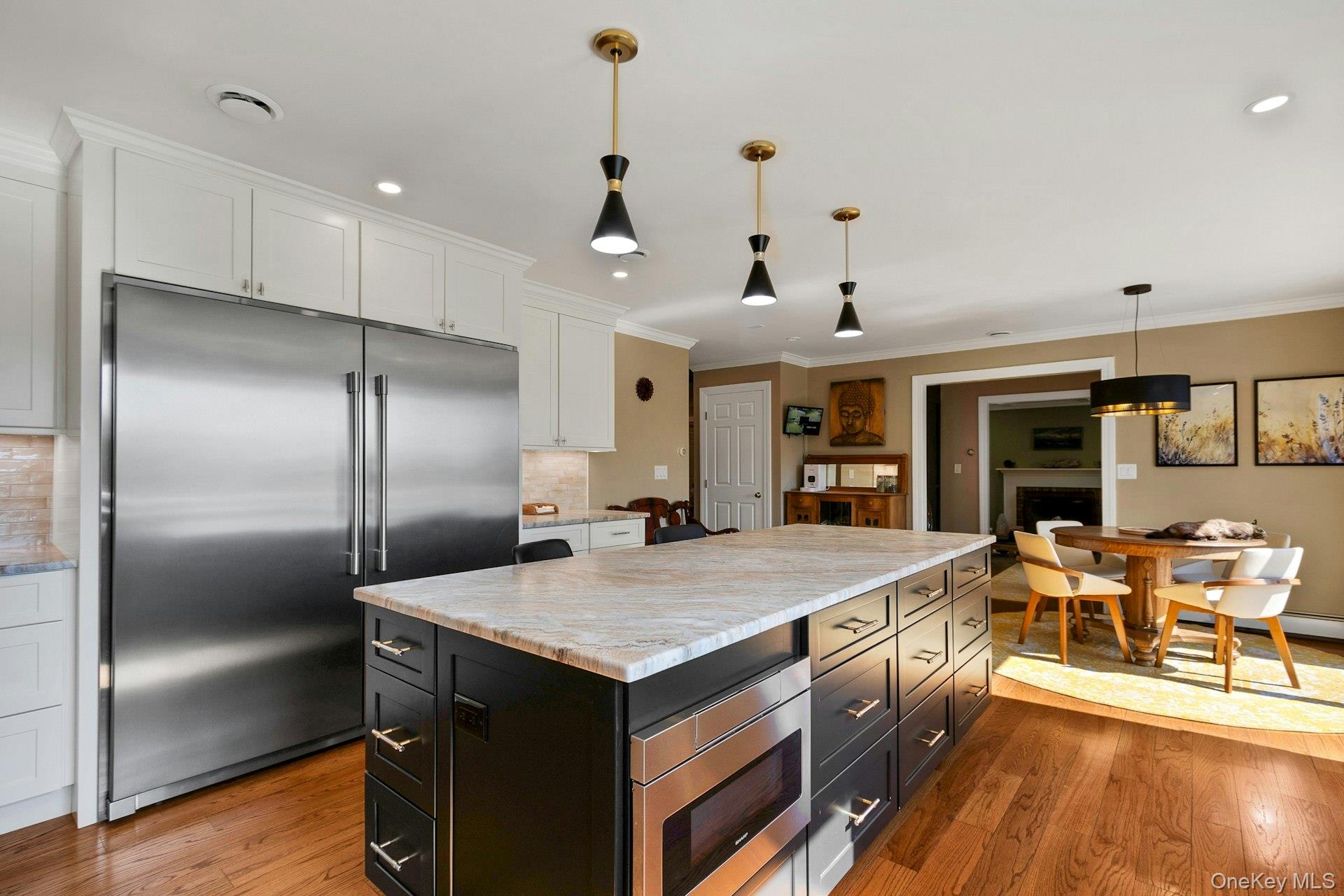 97 Moffat Road Washingtonville, NY 10992 - Photo 16 of 48 a large kitchen with kitchen island a large counter top appliances and cabinets