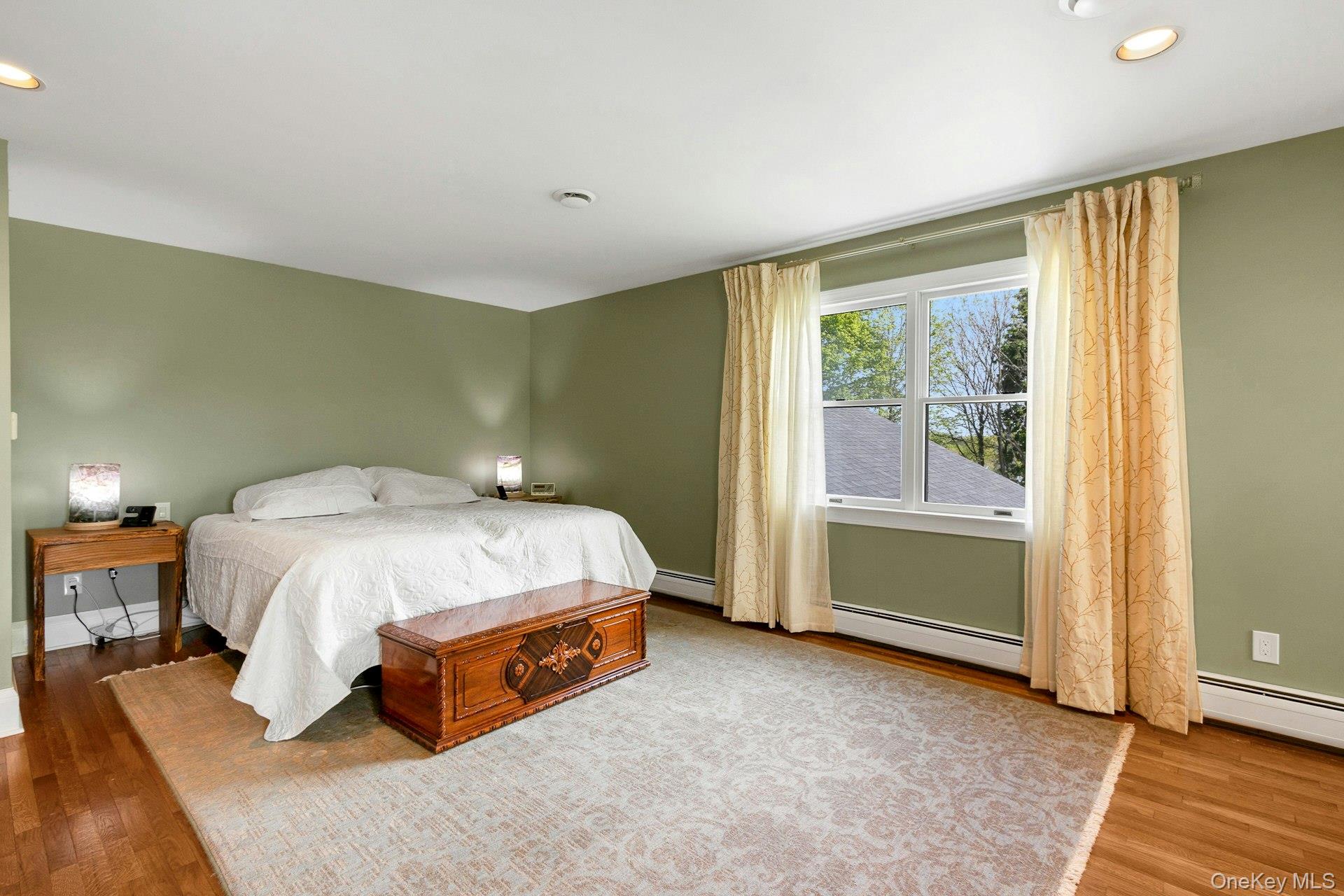 97 Moffat Road Washingtonville, NY 10992 - Photo 31 of 48 a spacious bedroom with a bed and a window