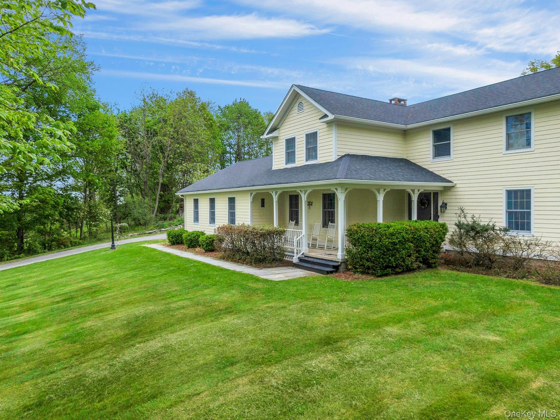97 Moffat Road Washingtonville, NY 10992 - Photo 4 of 48 a front view of a house with a yard