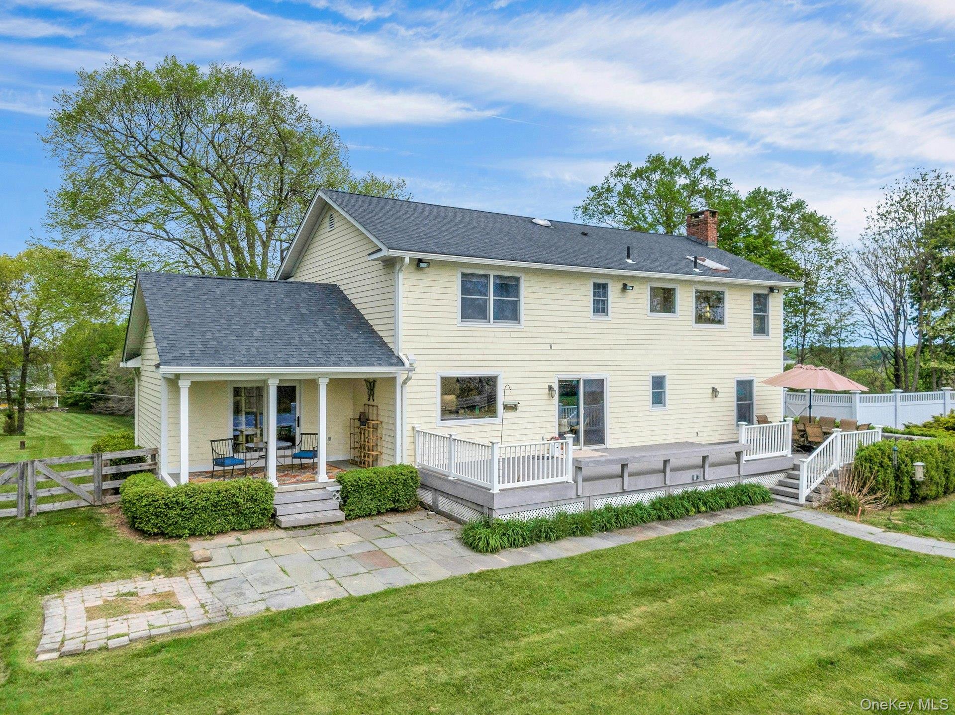 97 Moffat Road Washingtonville, NY 10992 - Photo 43 of 48 a view of a house with a yard and sitting area