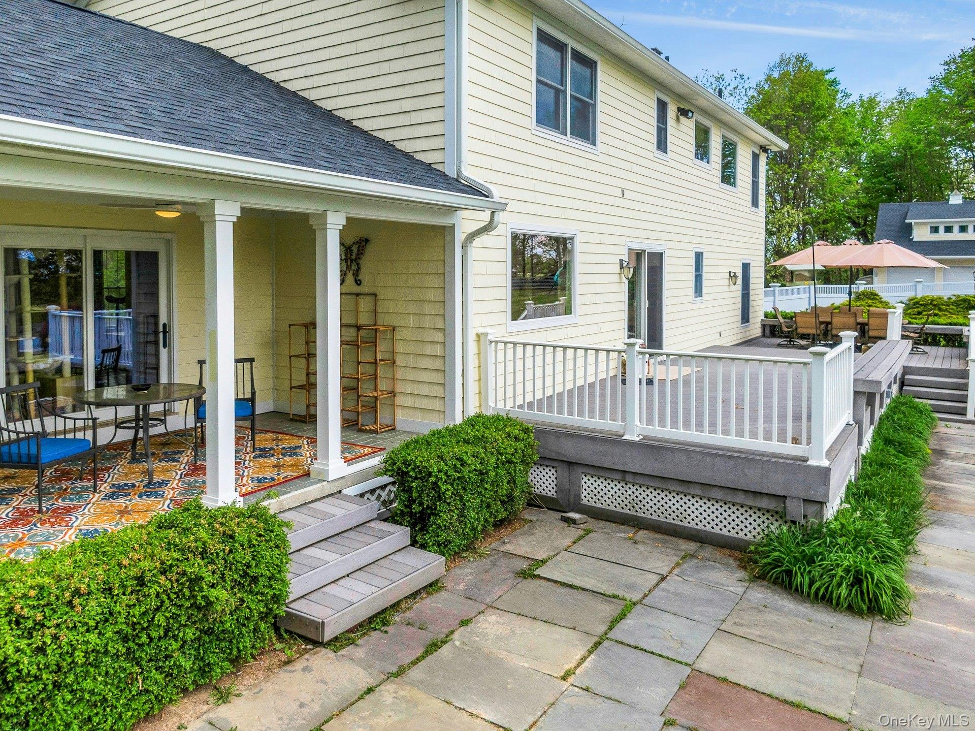 97 Moffat Road Washingtonville, NY 10992 - Photo 44 of 48 a view of a house with a small yard and flower plants