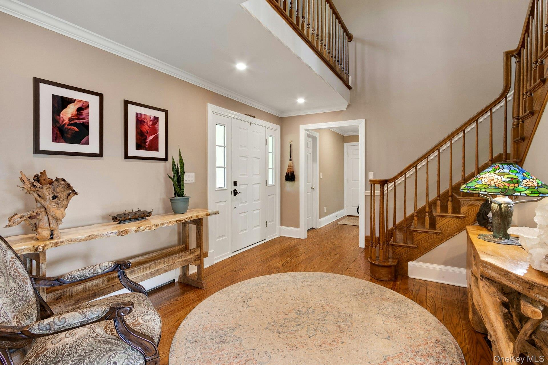 97 Moffat Road Washingtonville, NY 10992 - Photo 10 of 48 a view of a livingroom with furniture a dinning room and stairs