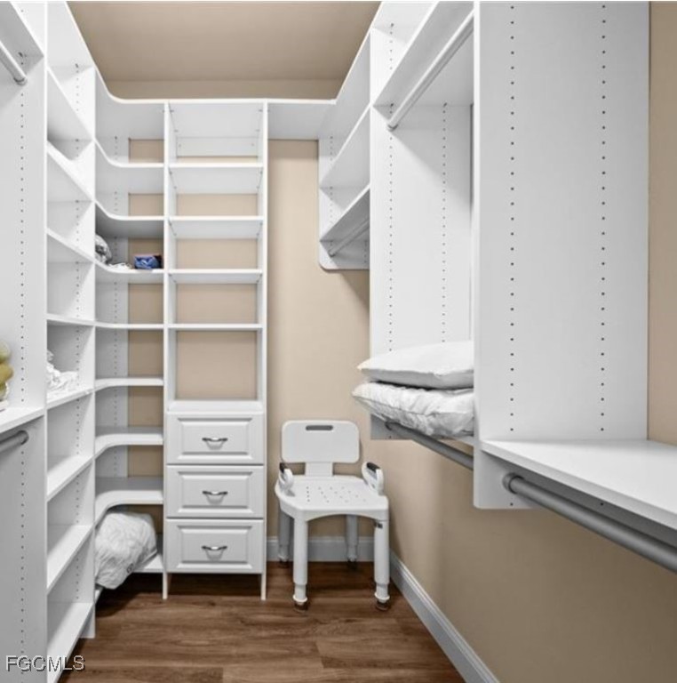 14970 Vista View Way, Unit 304 Fort Myers, FL 33919 - Photo 13 of 37 a view of walk in closet with empty racks