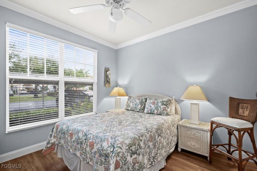 14970 Vista View Way, Unit 304 Fort Myers, FL 33919 - Photo 14 of 37 a bedroom with a bed and a window
