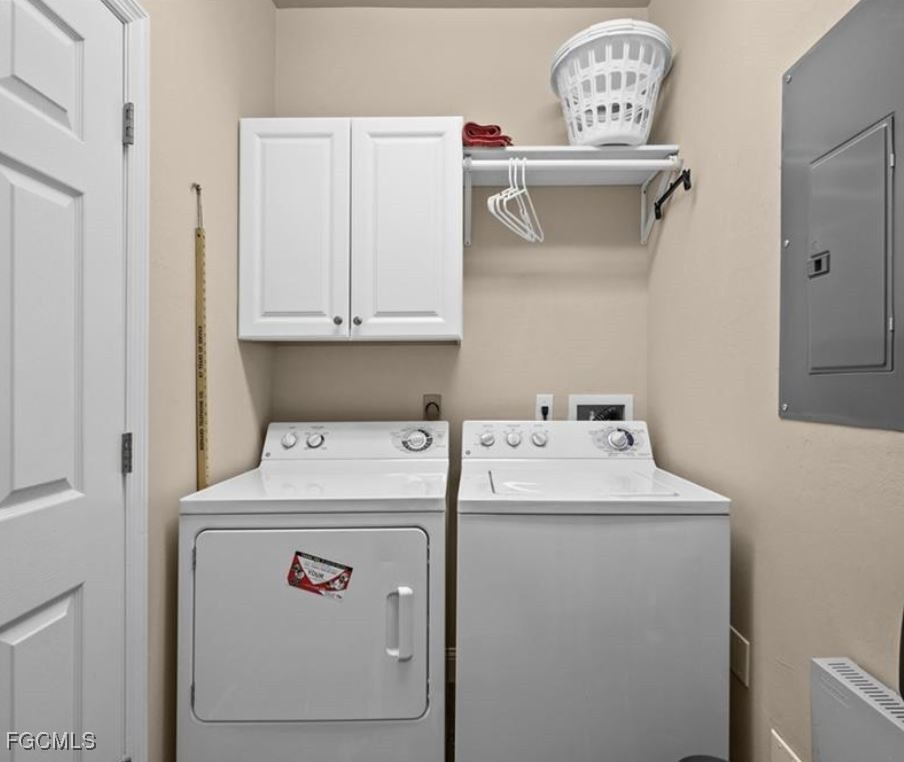 14970 Vista View Way, Unit 304 Fort Myers, FL 33919 - Photo 16 of 37 a utility room with dryer and washer