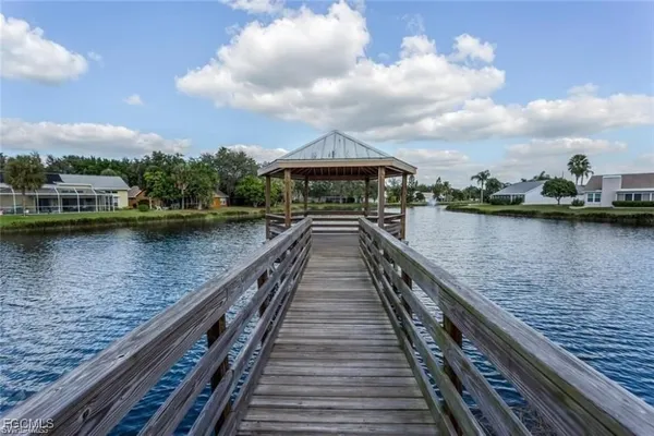 a view of swimming pool with a lake view
