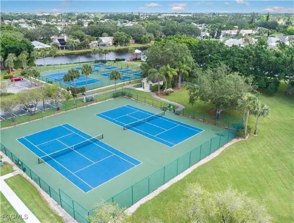 a view of an outdoor space and tennis court