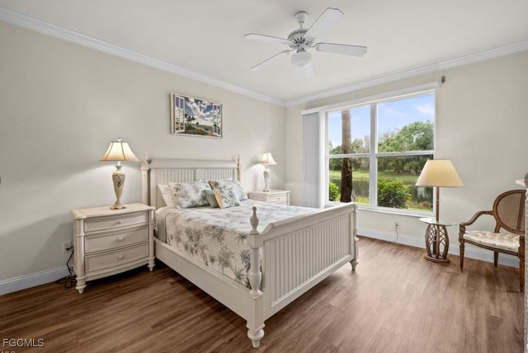 14970 Vista View Way, Unit 304 Fort Myers, FL 33919 - Photo 9 of 37 a bed room with bed and window