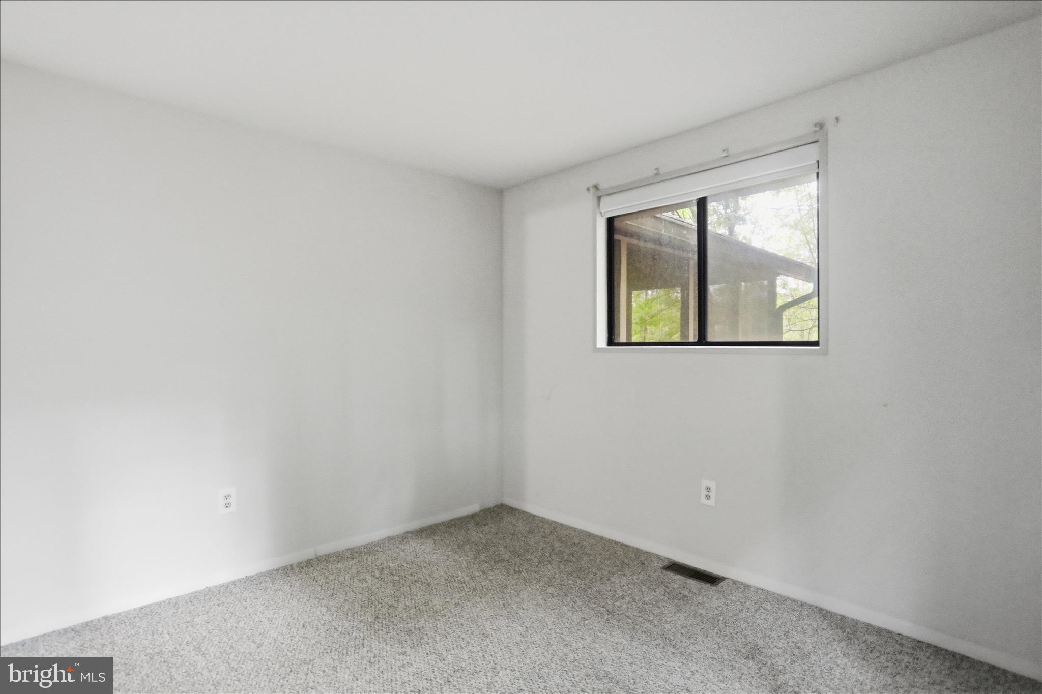 578 Walden Road Hedgesville, WV 25427 - Photo 14 of 39 an empty room with windows