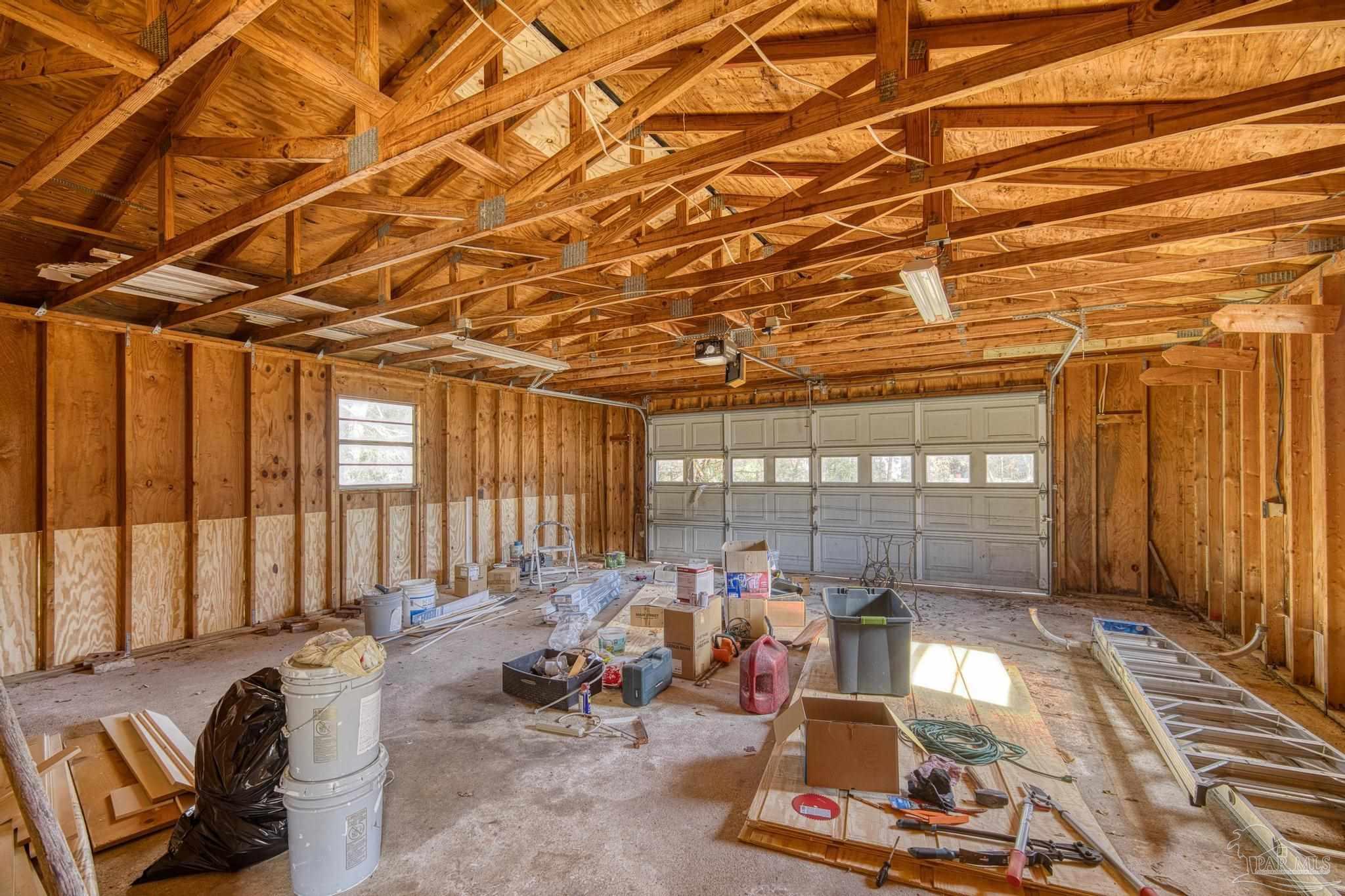 7988 Malone Road Milton, FL 32570 - Photo 42 of 69 a view of a room with gym equipment