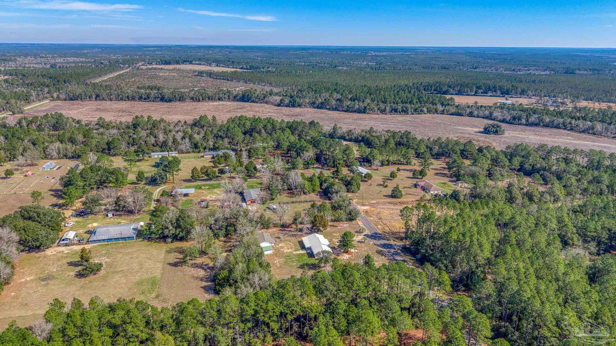 7988 Malone Road Milton, FL 32570 - Photo 51 of 69 an aerial view of a city