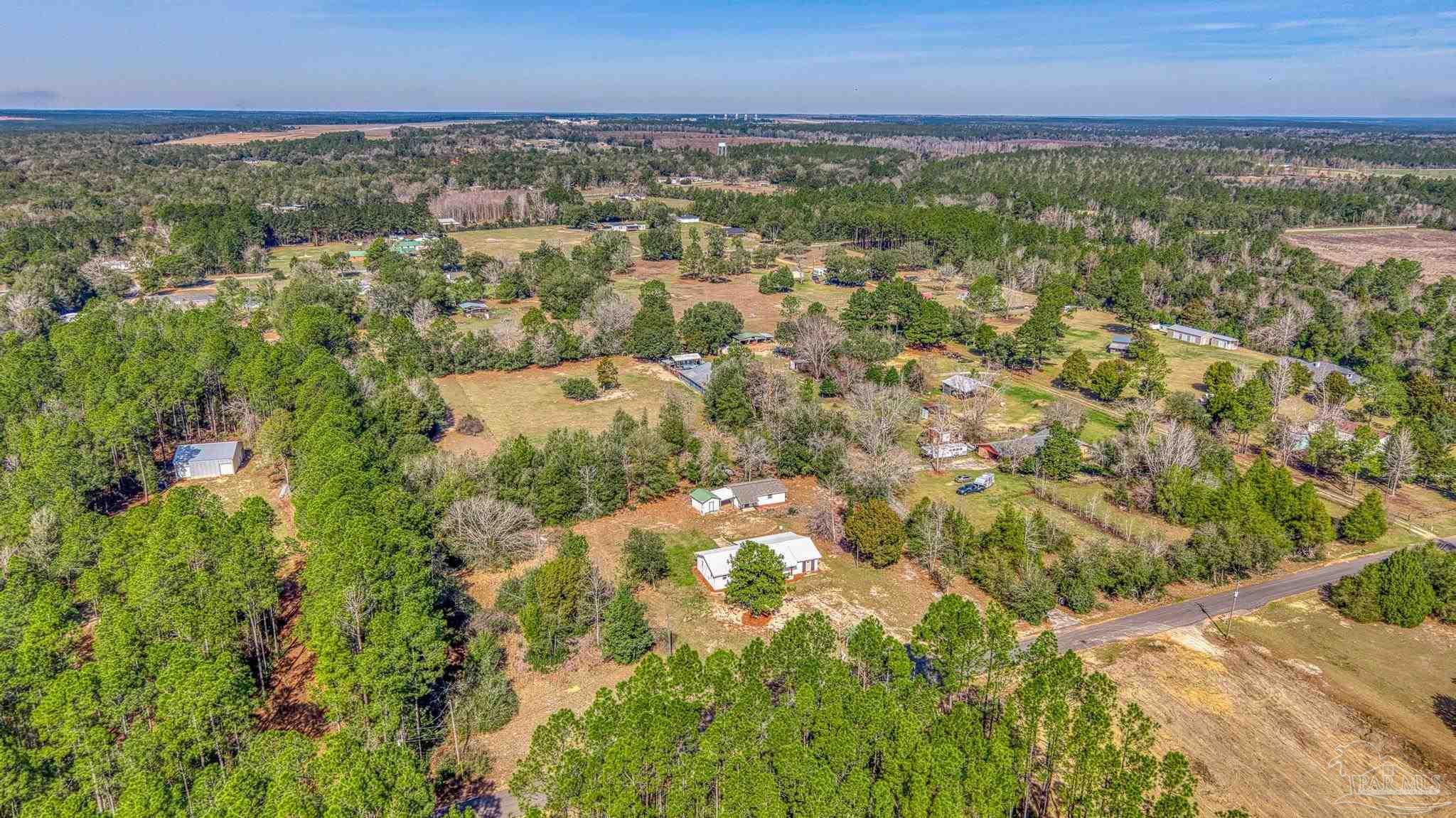 7988 Malone Road Milton, FL 32570 - Photo 55 of 69 a view of a city with an outdoor space