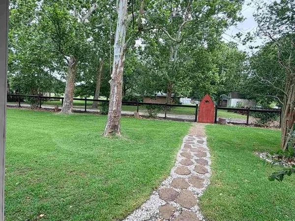 a childrens park with lots of trees