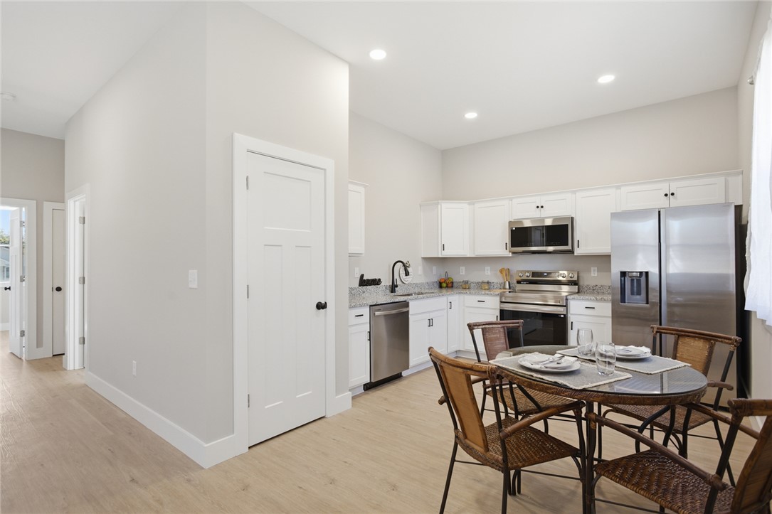 216 South Stribling Street Seneca, SC 29678 - Photo 14 of 38 This bright kitchen features modern stainless steel appliances and ample cabinet space.