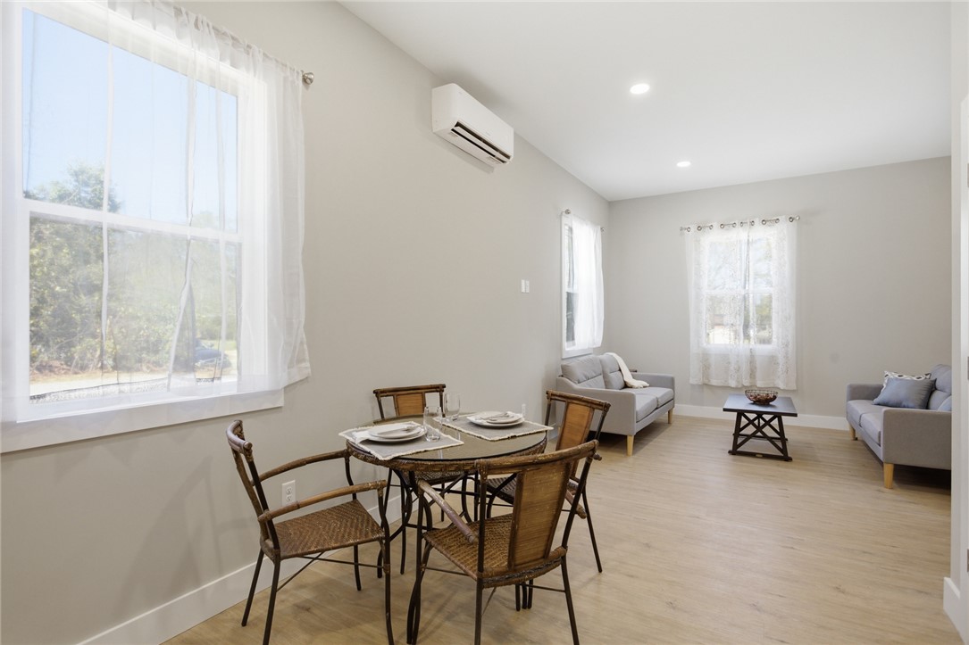 216 South Stribling Street Seneca, SC 29678 - Photo 16 of 38 This bright and airy room offers a comfortable dining and living area.