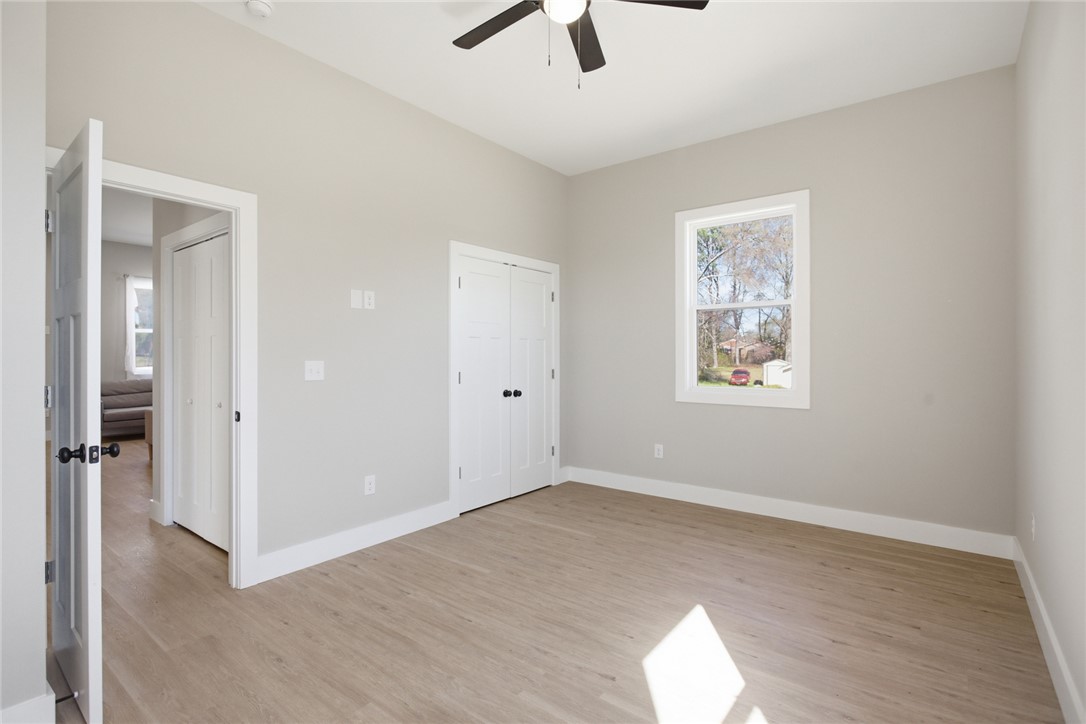 216 South Stribling Street Seneca, SC 29678 - Photo 17 of 38 Bright and airy, this room features durable flooring and ample natural light.