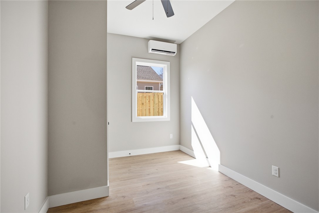216 South Stribling Street Seneca, SC 29678 - Photo 23 of 38 This airy room offers a bright, versatile space, perfect for any use.