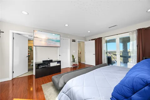 a bathroom with a double vanity sink toilet and shower