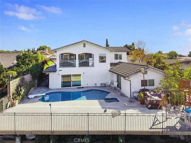 a view of a balcony with an outdoor space and lakeside