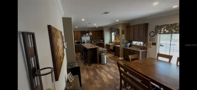 a view of a swimming pool with a patio