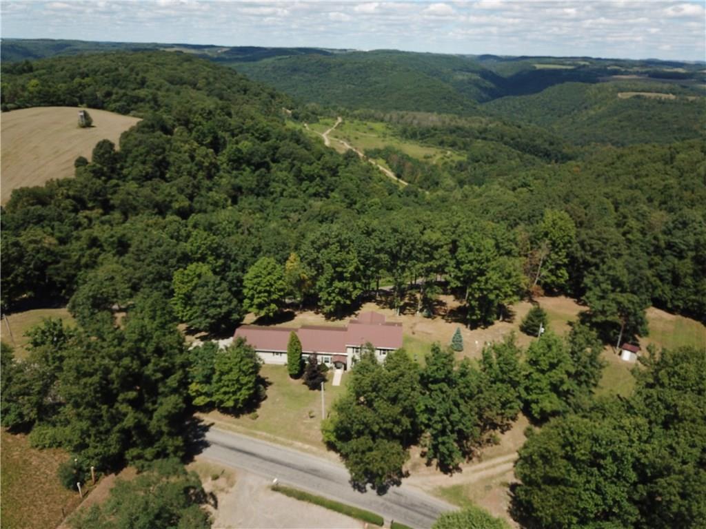 1130 Ridge Road Templeton, PA 16259 - Photo 25 of 25 an aerial view of residential houses with outdoor space and trees